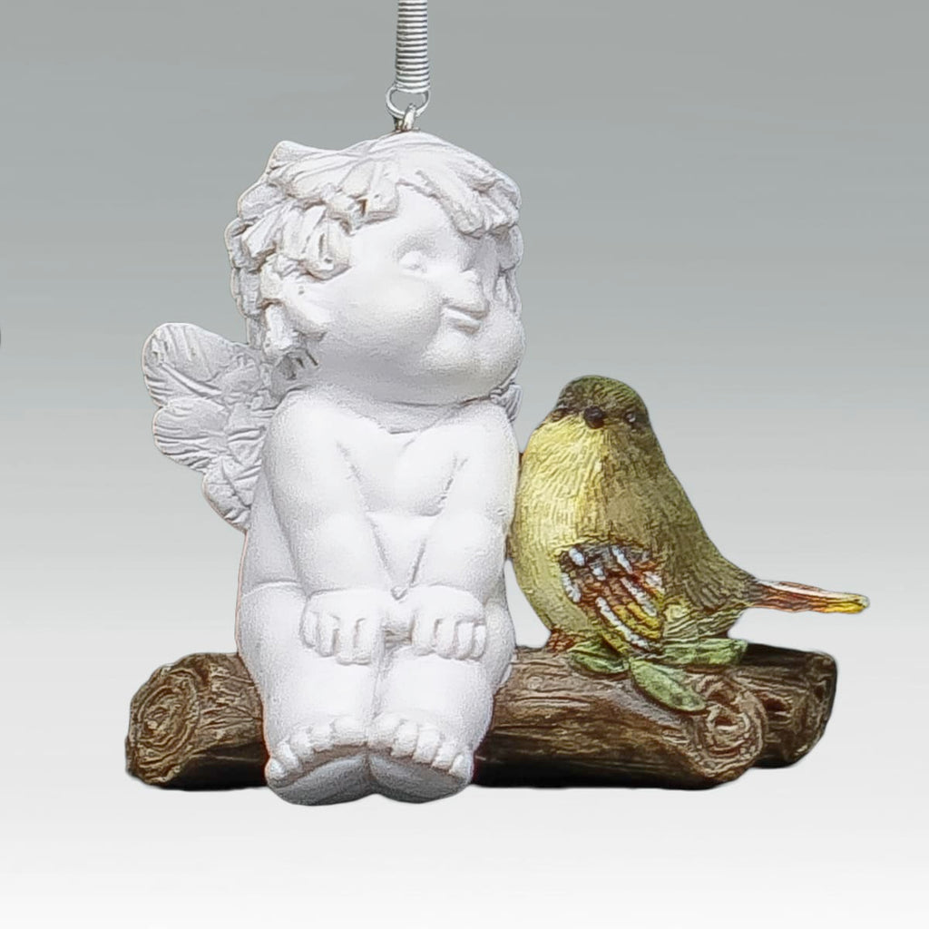 Igor auf Vogel hängend an Feder - Füsse baumelnd mit Vögelchen