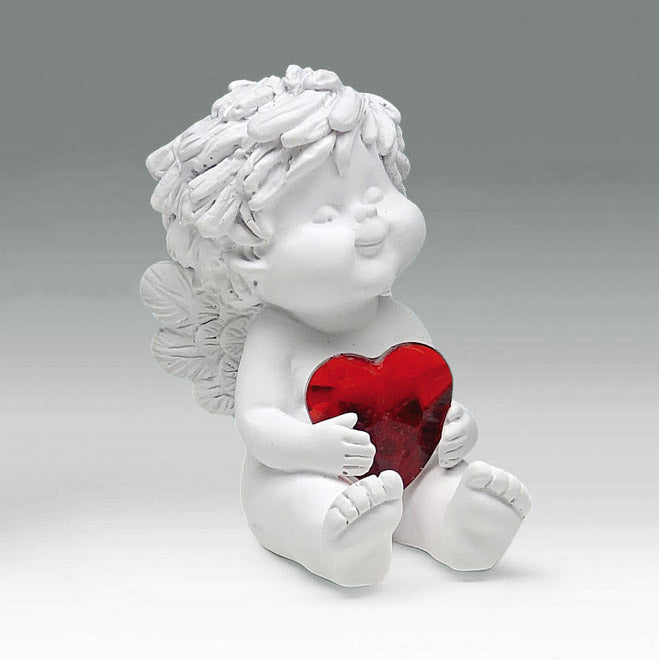 Liebesengel Igor mit Kristall-Herz - sitzend mit gestreckten Beinen mit Kristallherz