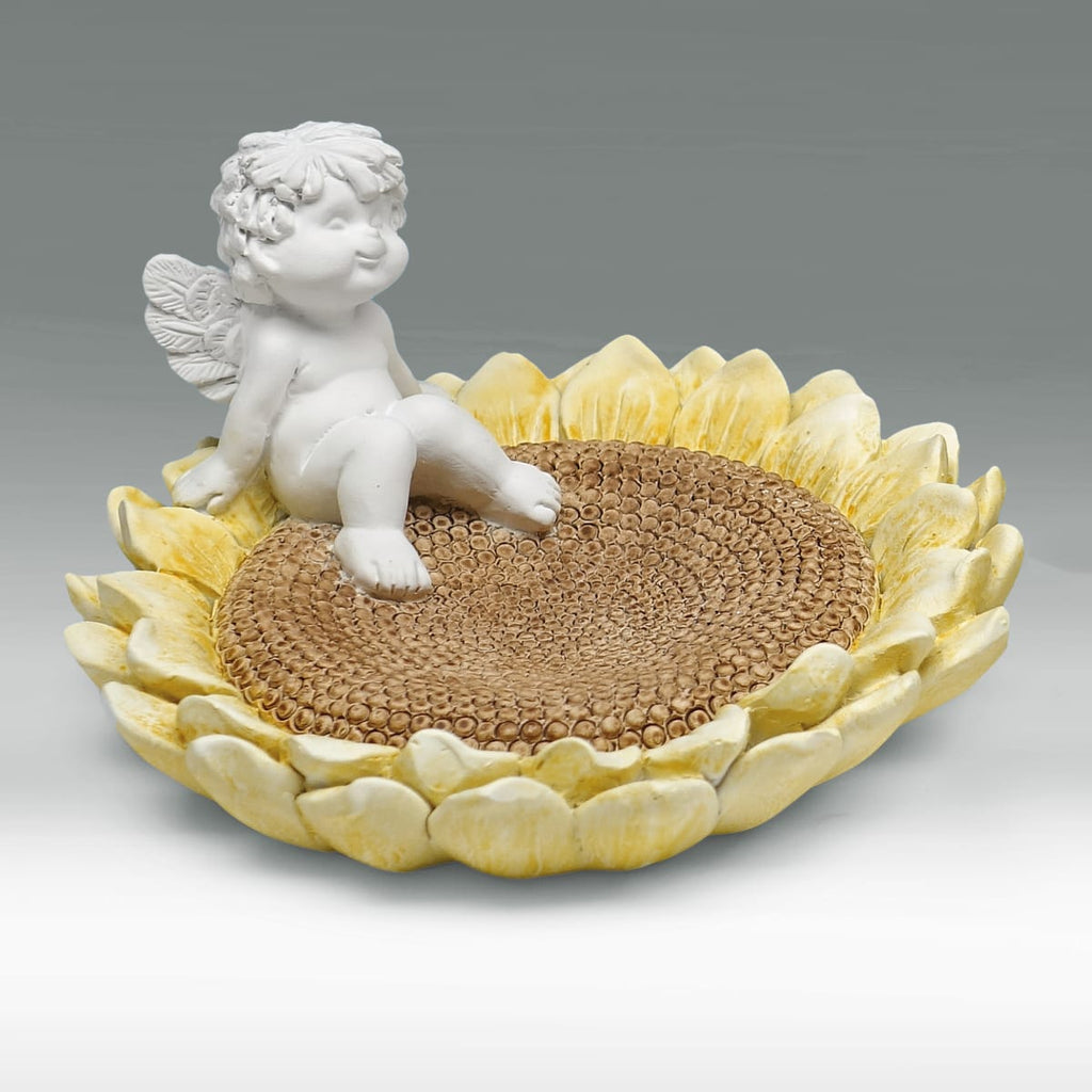 Igor auf Sonnenblume Schale - in Schale sitzend